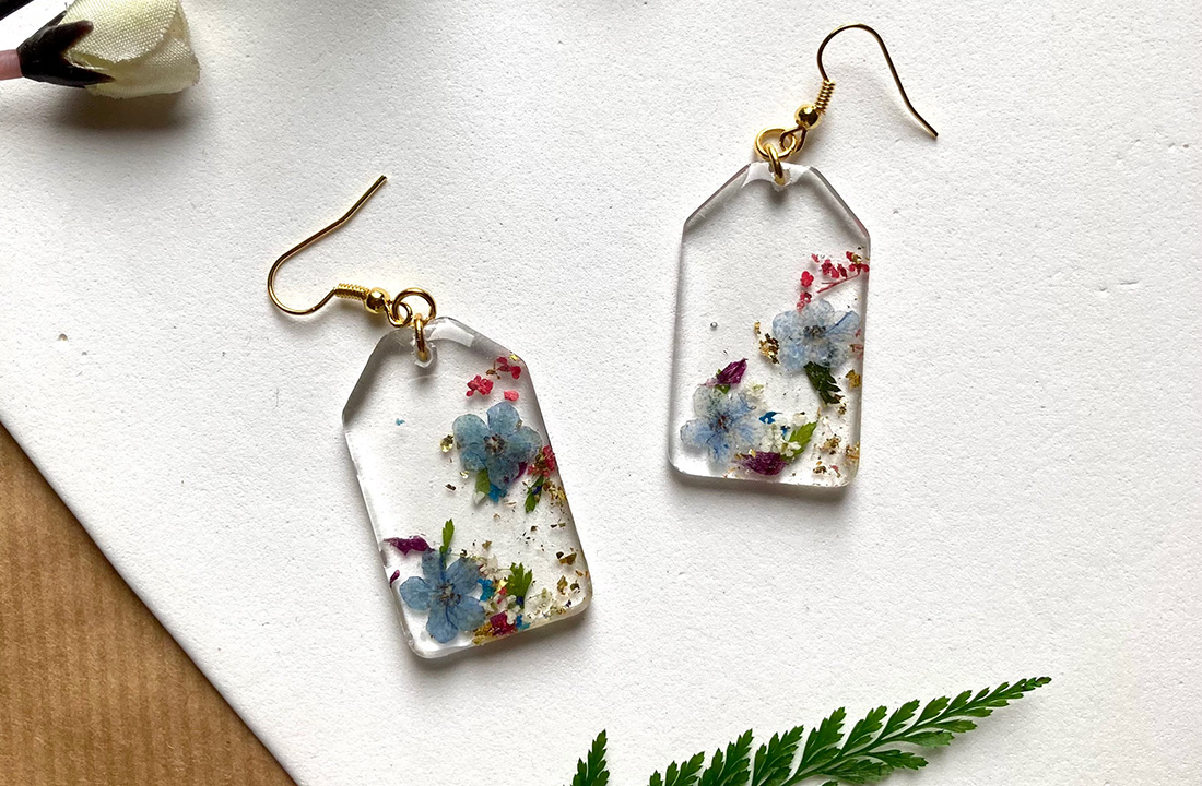 Resin earrings on the table